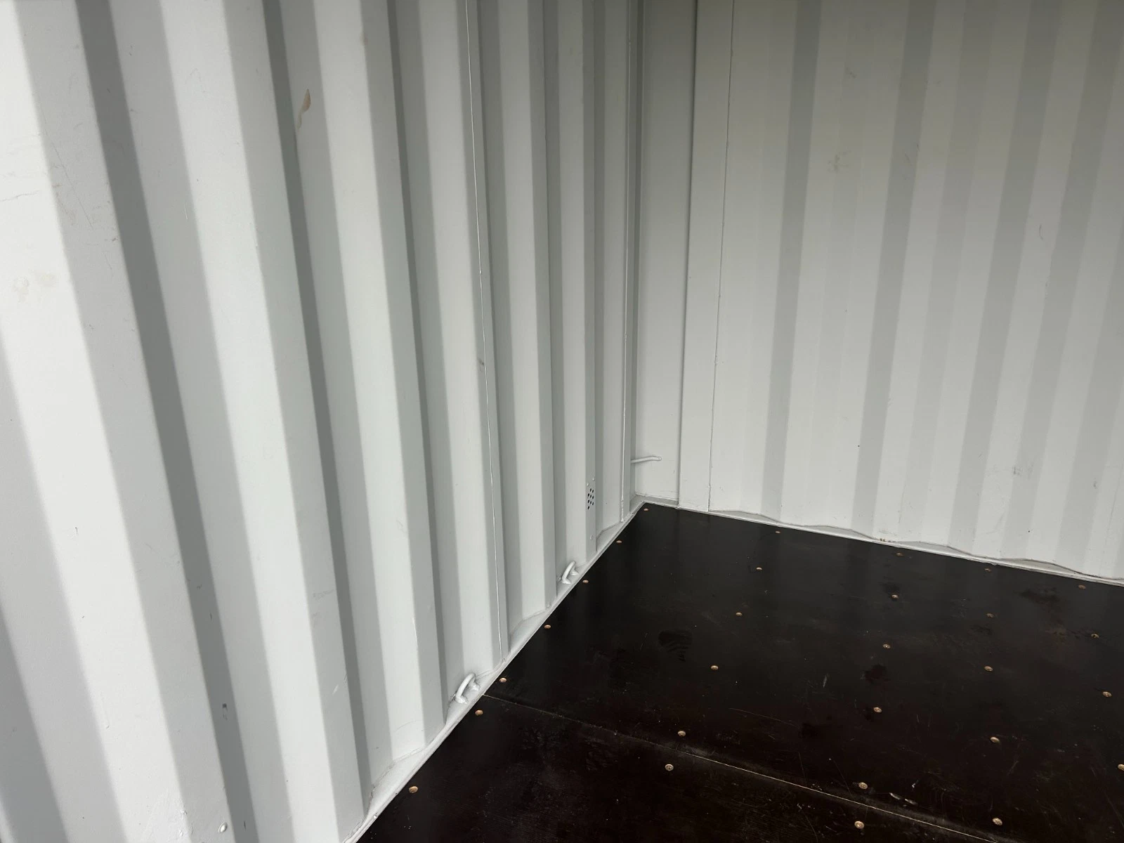 Small 10ft cargo container with secure locking doors and plywood floor