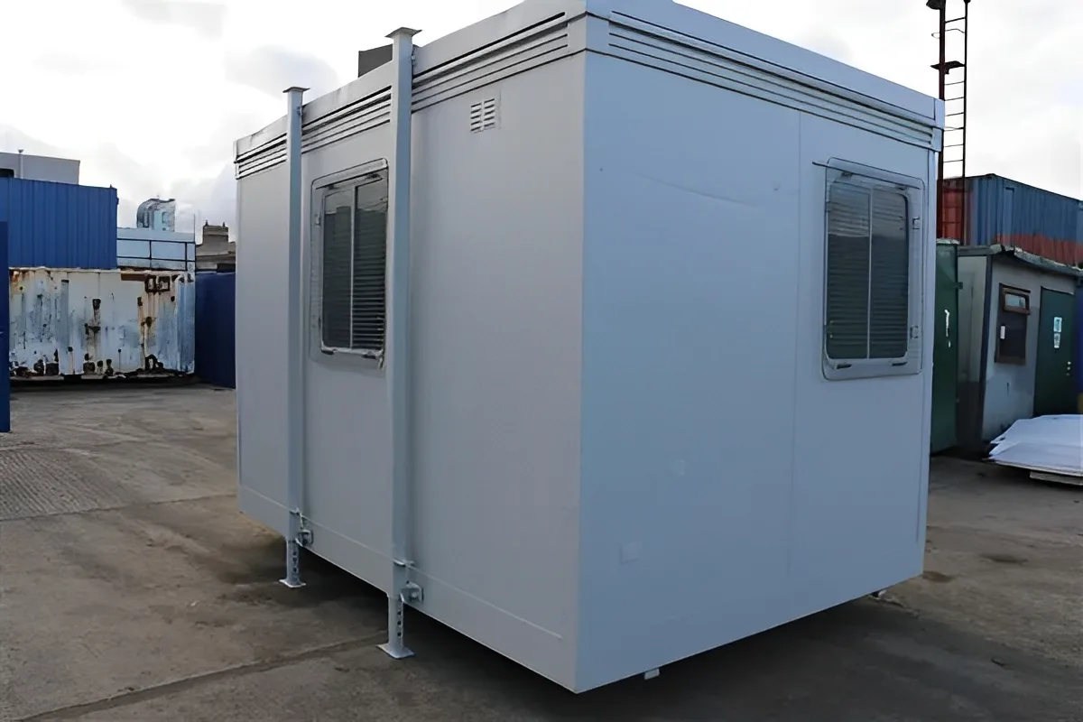 Portable construction site office cabin with heating and lighting installed