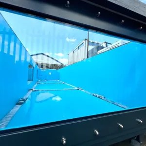 Portable container pool with automated water treatment and filtration system