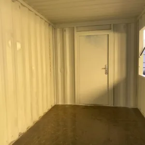 Portable container bar with serving hatch and weatherproof steel construction