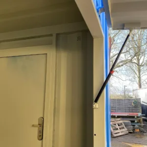 Shipping container food kiosk with electrical installation and sink unit