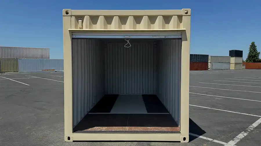 Compact 16ft steel storage container with vertical roll-up access door