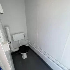 16ft x 9ft toilet block shipping container with 3 standard toilets and 1 accessible restroom
