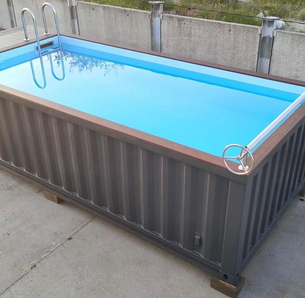 Custom 20 ft container swimming pool with built-in seating and filtration system