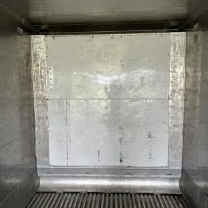 Refrigerated shipping container with secure cargo doors and insulated walls