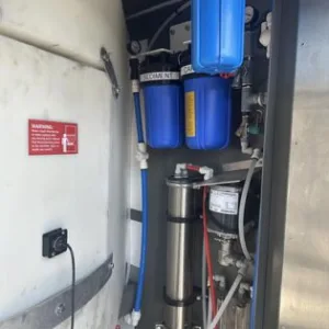 Lightly used Kooler Ice IM1500 self-service ice and water kiosk
