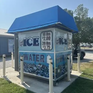 Automated ice and water vending machine with low production hours