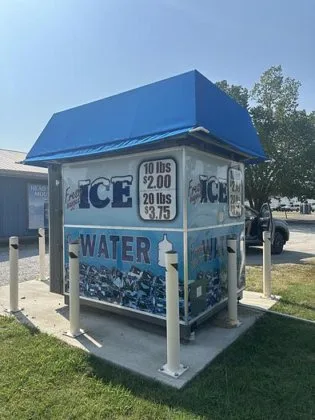 Automated ice and water vending machine with low production hours