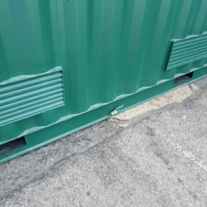 Hazardous material storage container with secondary spill containment