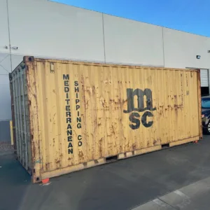 Yellow 20ft shipping container for construction site storage