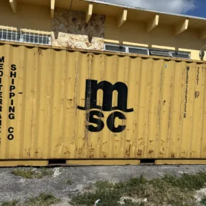 Used 20ft Conex shipping container in yellow and gold finish