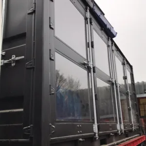 20ft shipping container converted into a workshop with glass windows