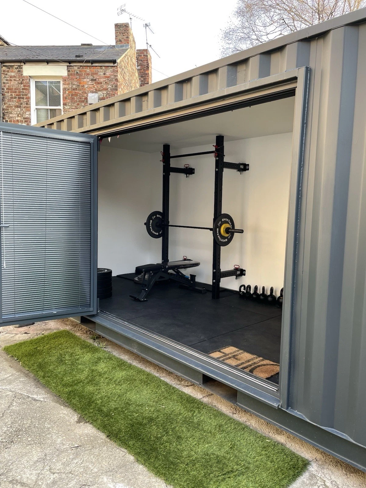 Modern 20ft container gym and office space with LED lighting
