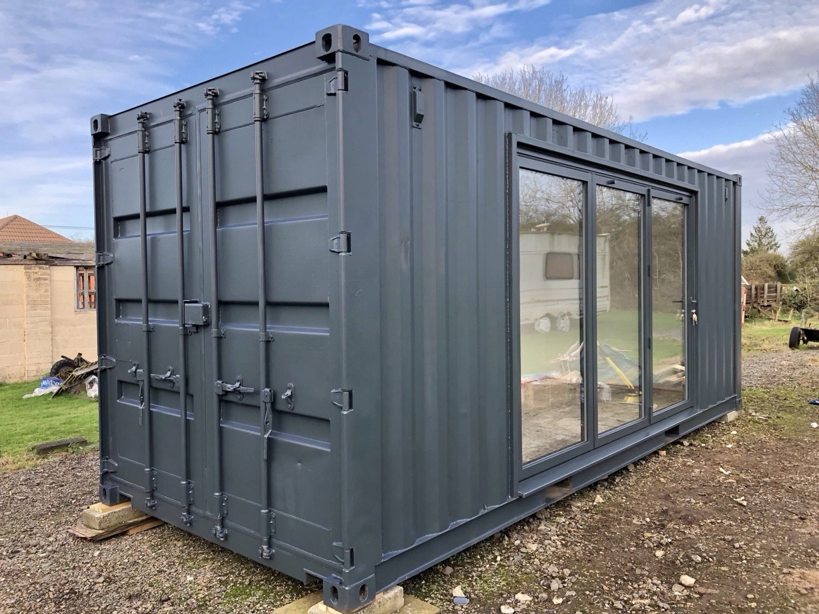 Converted 20ft shipping container gym with durable corten steel construction