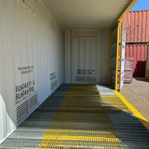 Heavy-duty hazardous goods container with ventilation system and spill containment