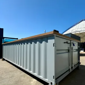 Portable container pool with swim jet system and integrated water heater