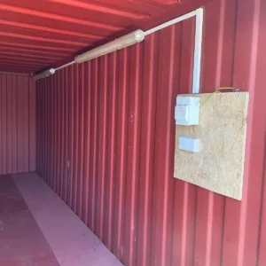 Secure 20ft storage container for construction site equipment and tools