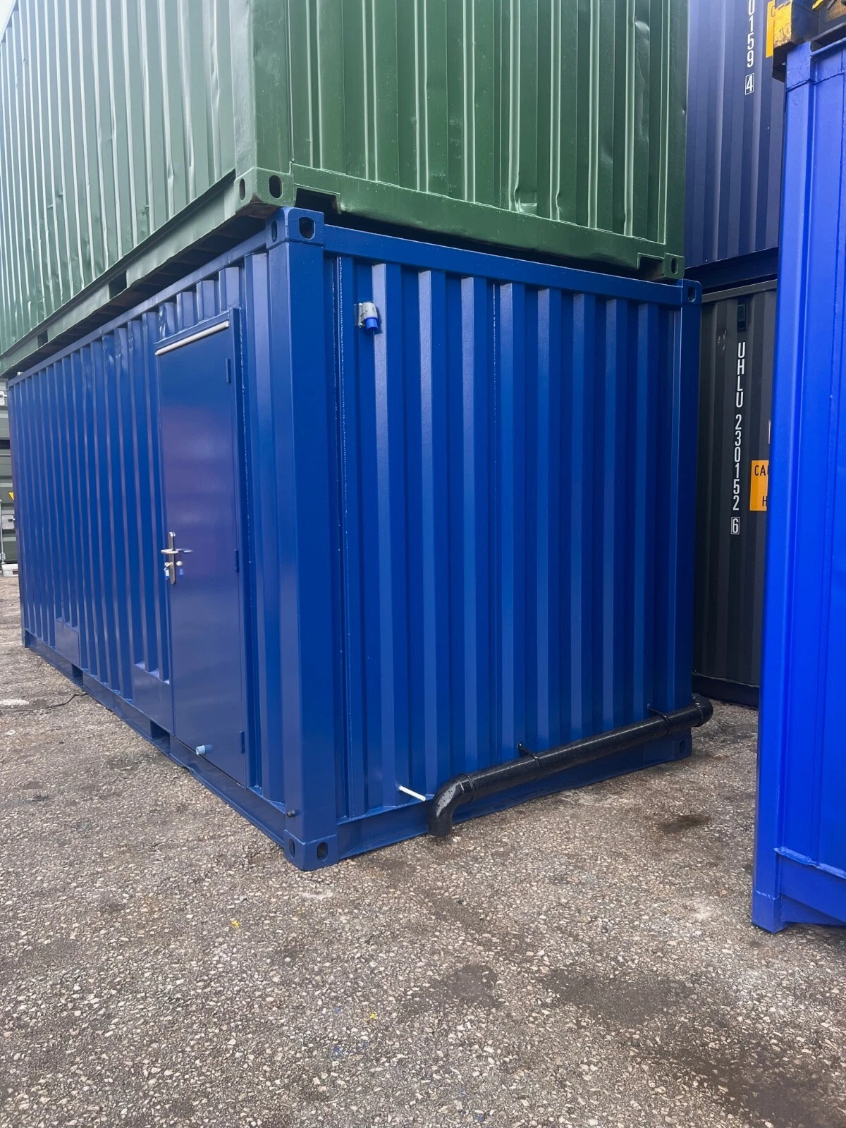 Self-contained shipping container restroom with LED lighting and ventilation system