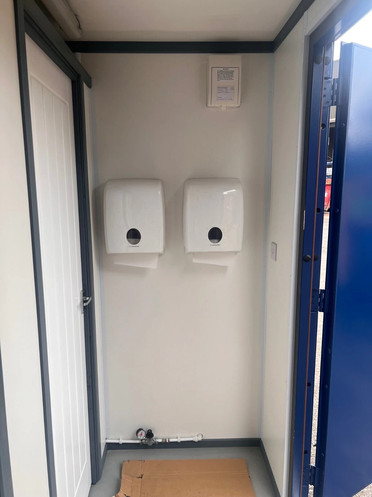 Commercial container toilet facility for parks, campgrounds, and public spaces