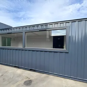 Portable office building with picture windows and secure steel door