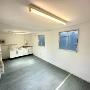 Secure welfare unit with canteen area, diesel generator, and anti-vandal shutters