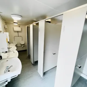 Portable welfare unit with toilets, wash basins, and shower room