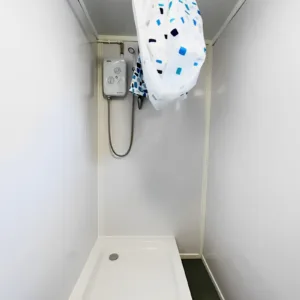 Commercial toilet block with separate male and female washroom facilities