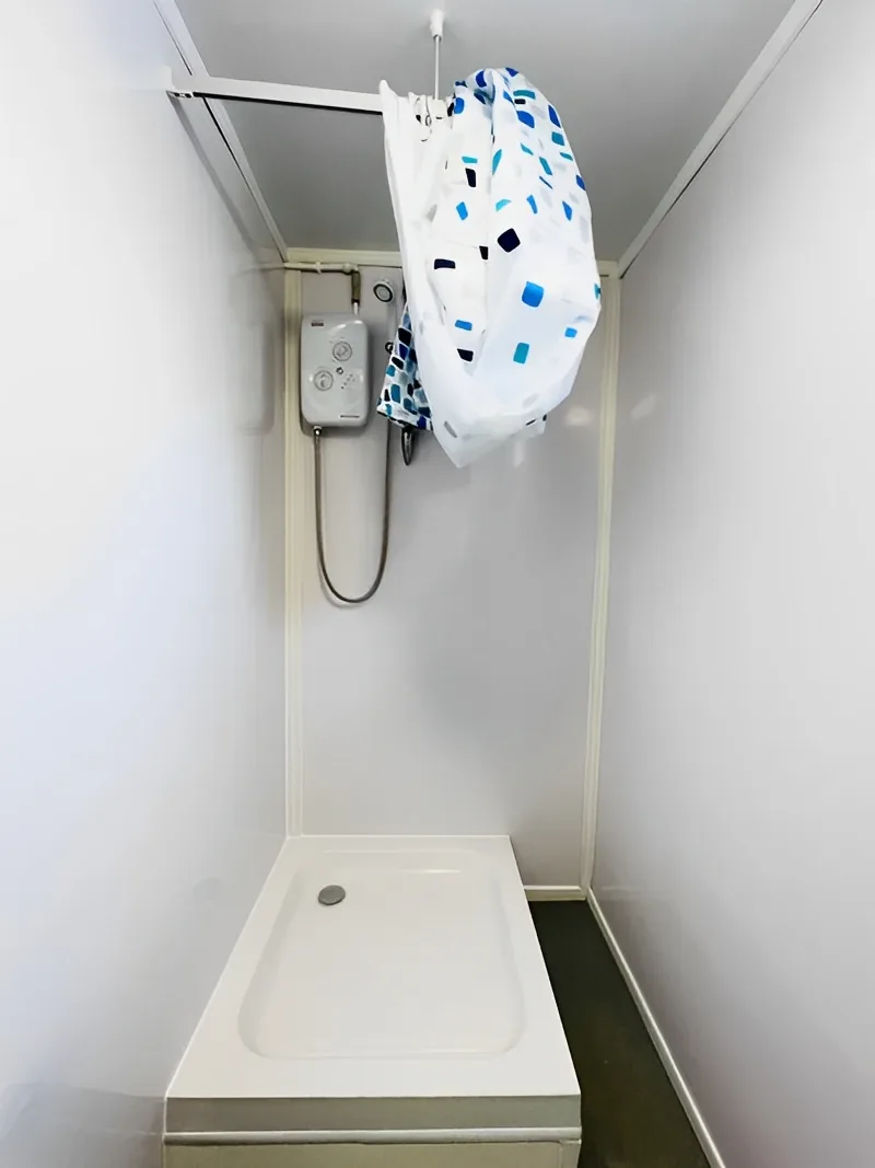 Commercial toilet block with separate male and female washroom facilities