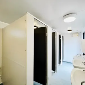Modular toilet block with shower room and energy-efficient lighting