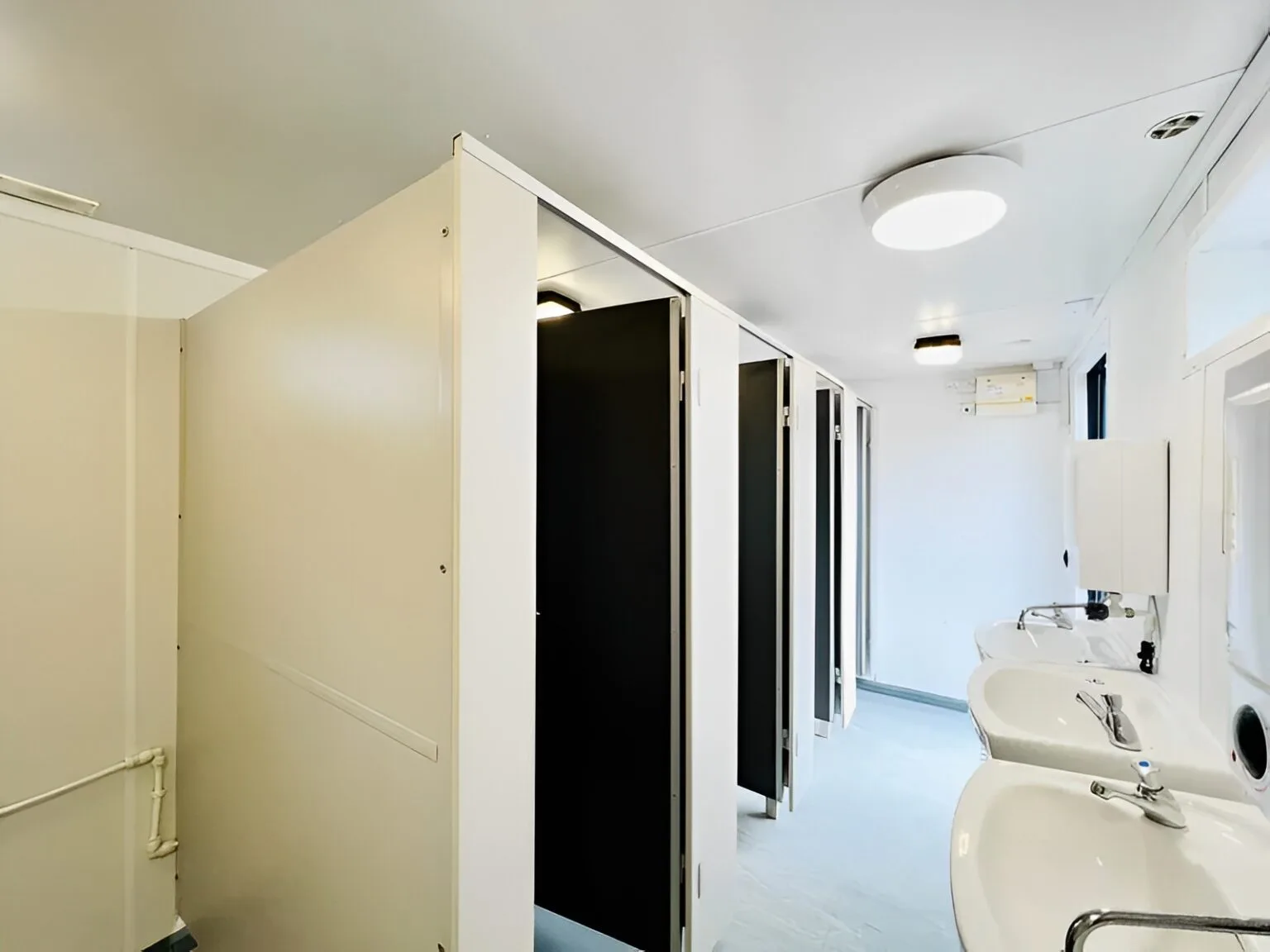 Modular toilet block with shower room and energy-efficient lighting