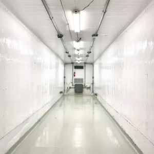 Insulated shipping container with secure entry door for office and storage applications