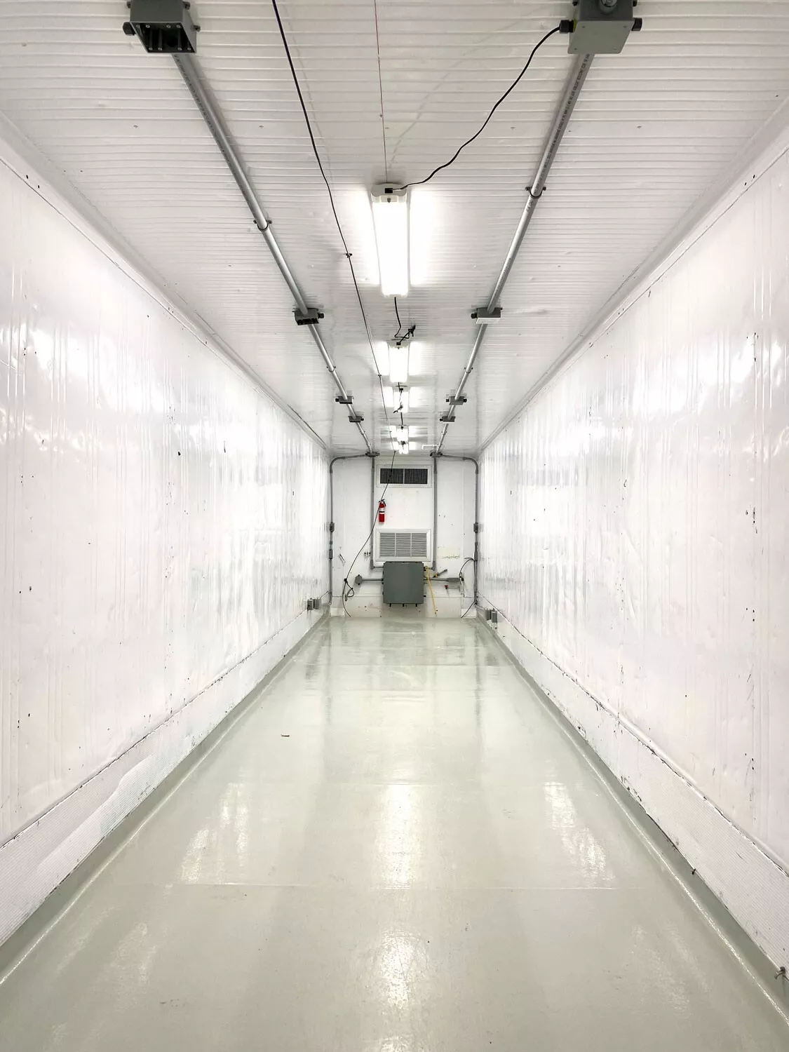 Insulated shipping container with secure entry door for office and storage applications