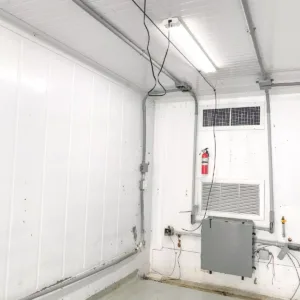 Climate-controlled 40ft shipping container with insulated interior and LED lighting