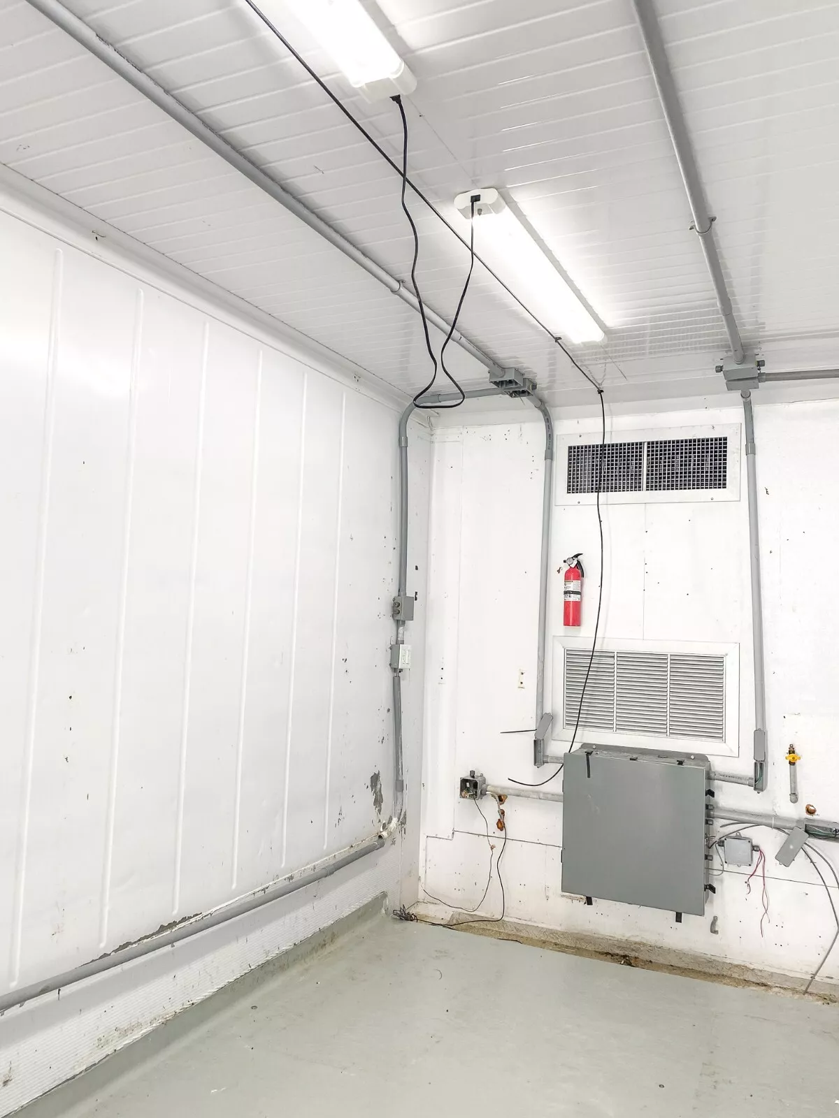 Climate-controlled 40ft shipping container with insulated interior and LED lighting