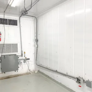Modified 40ft high cube container with HVAC, epoxy flooring, and electrical installation