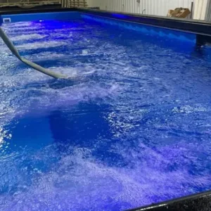 Luxury 40ft container pool with custom decking and outdoor lounge area