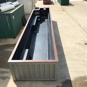 High cube shipping container pool for residential backyard installation
