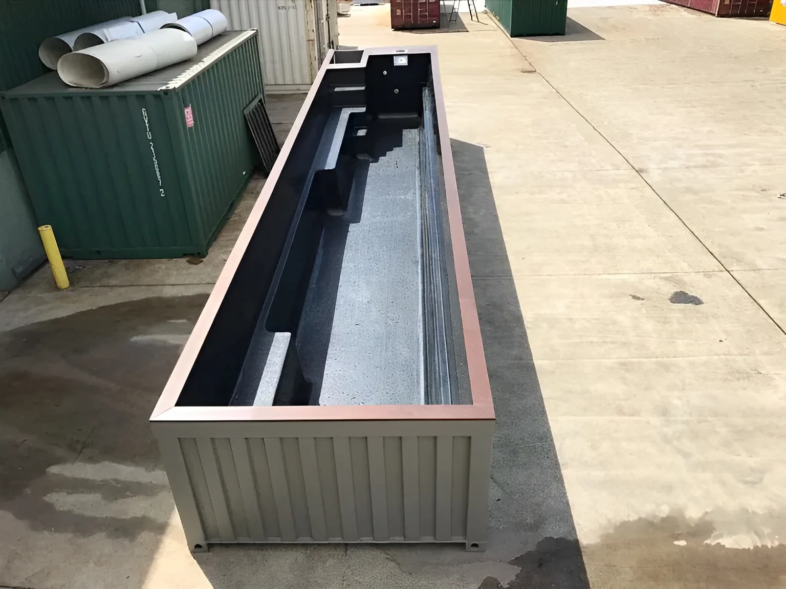 High cube shipping container pool for residential backyard installation