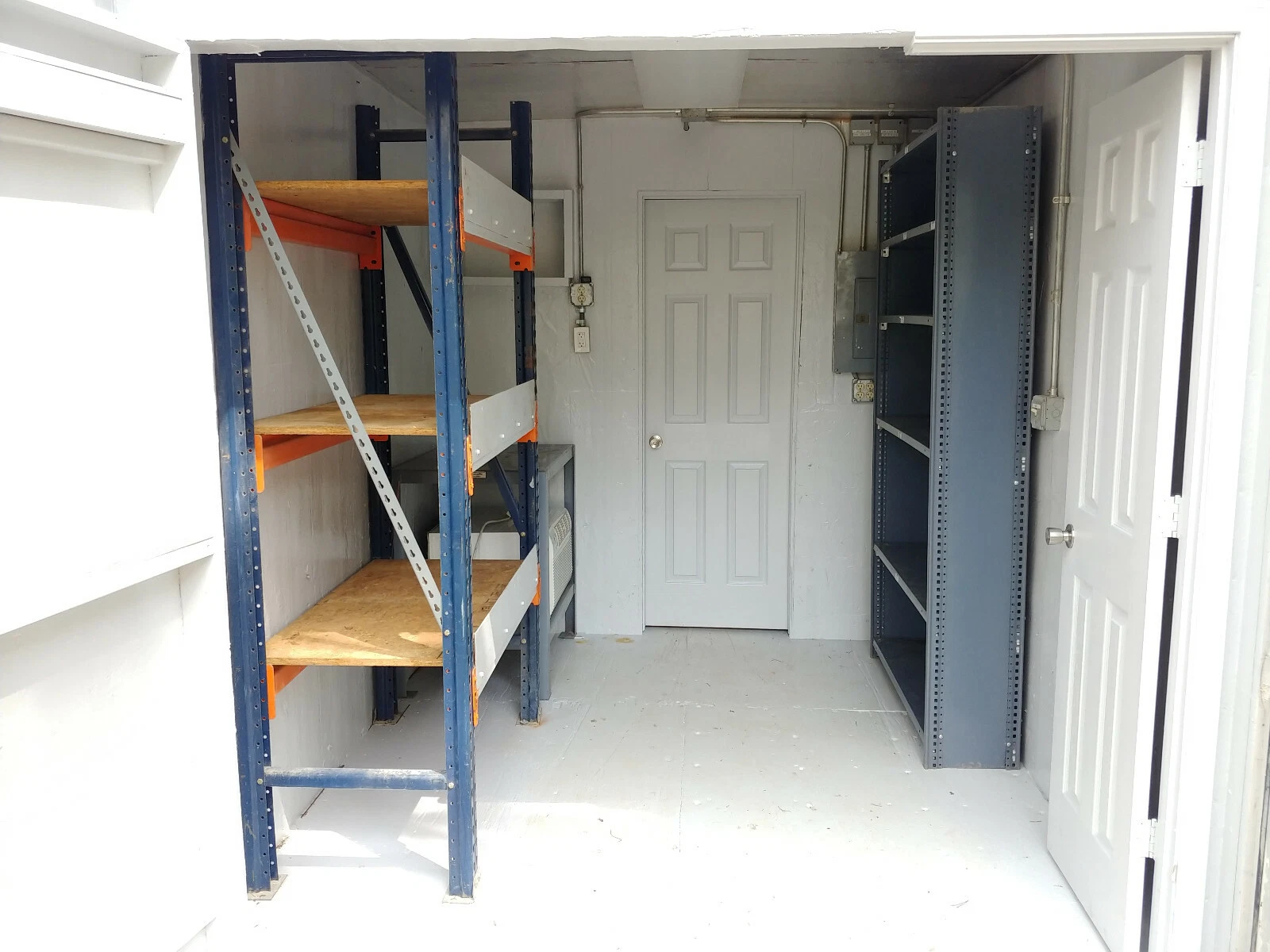 Modified 40ft shipping container with air conditioning and inventory racking