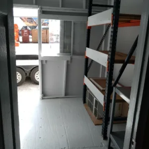 High cube container workspace with Frigidaire AC unit and LED lighting