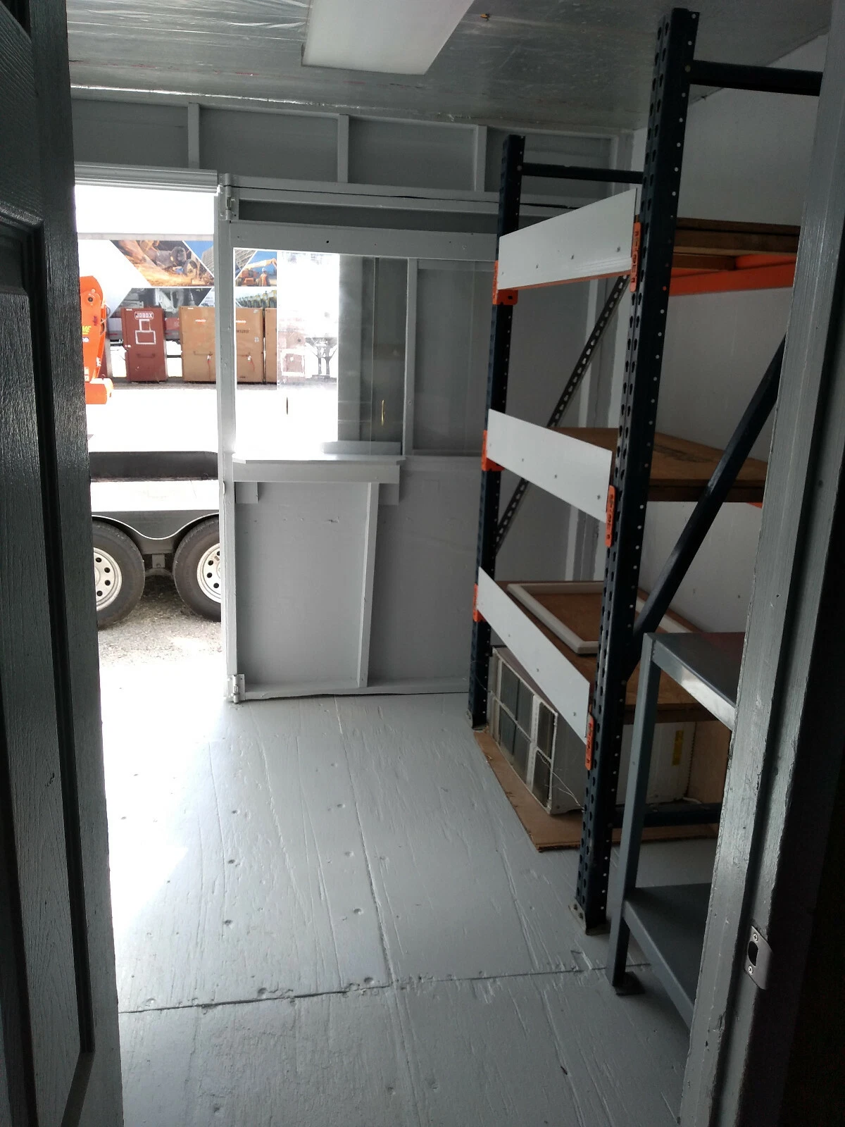 High cube container workspace with Frigidaire AC unit and LED lighting