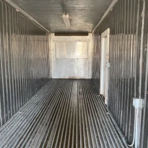 Portable cold storage container with custom side access and cargo doors