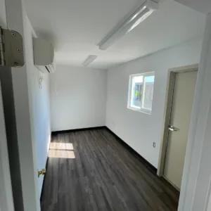 Mobile office container with fully accessible bathroom and climate-controlled workspace