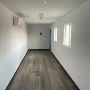 40ft container workspace with ADA bathroom, windows, and mini-split air conditioning