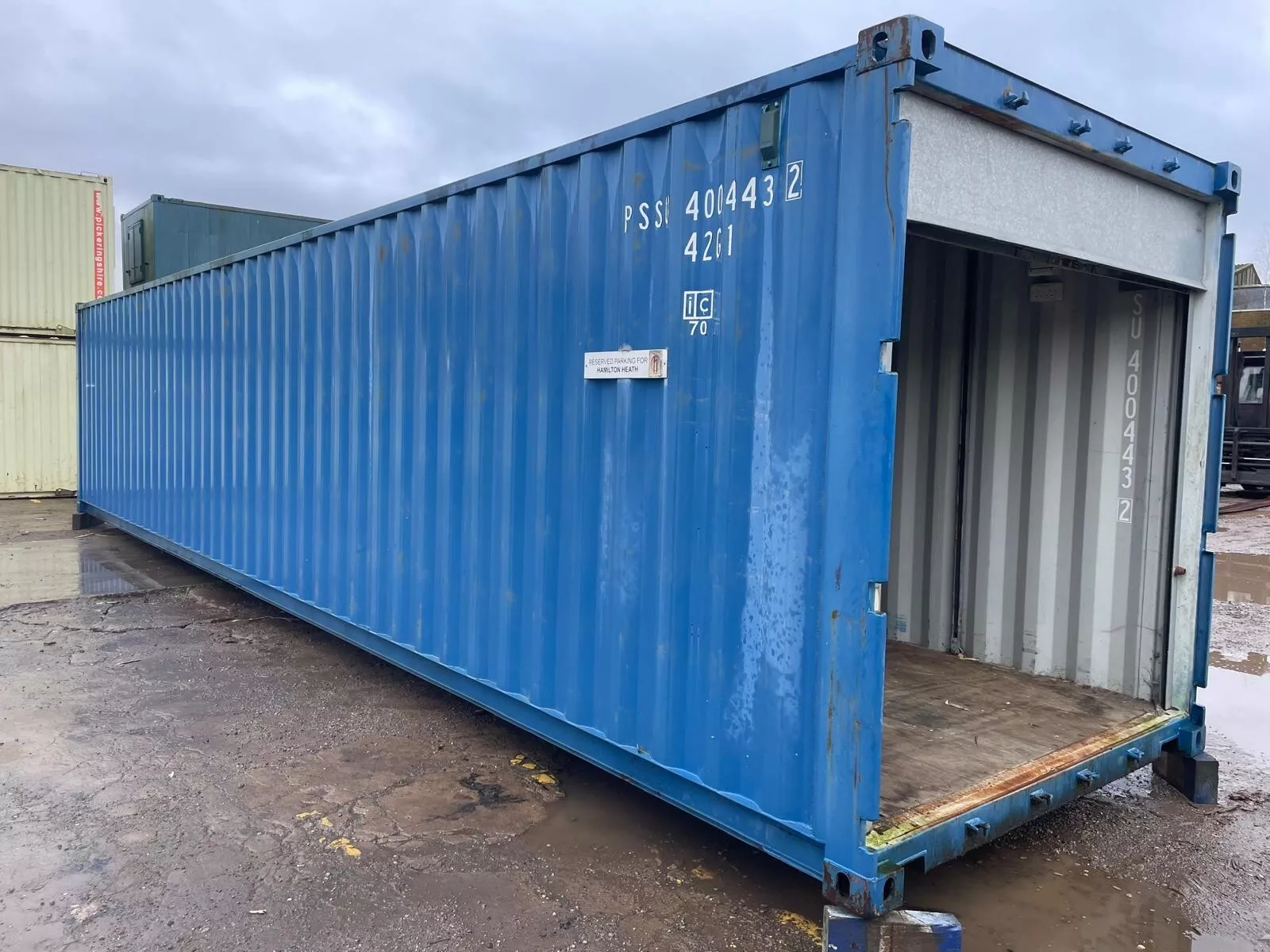Commercial 40ft shipping container converted with electrics and roll-up entry