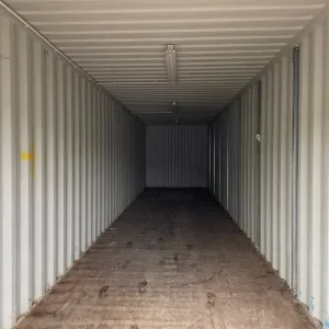 Wind and watertight 40ft shipping container with roll-up garage-style door