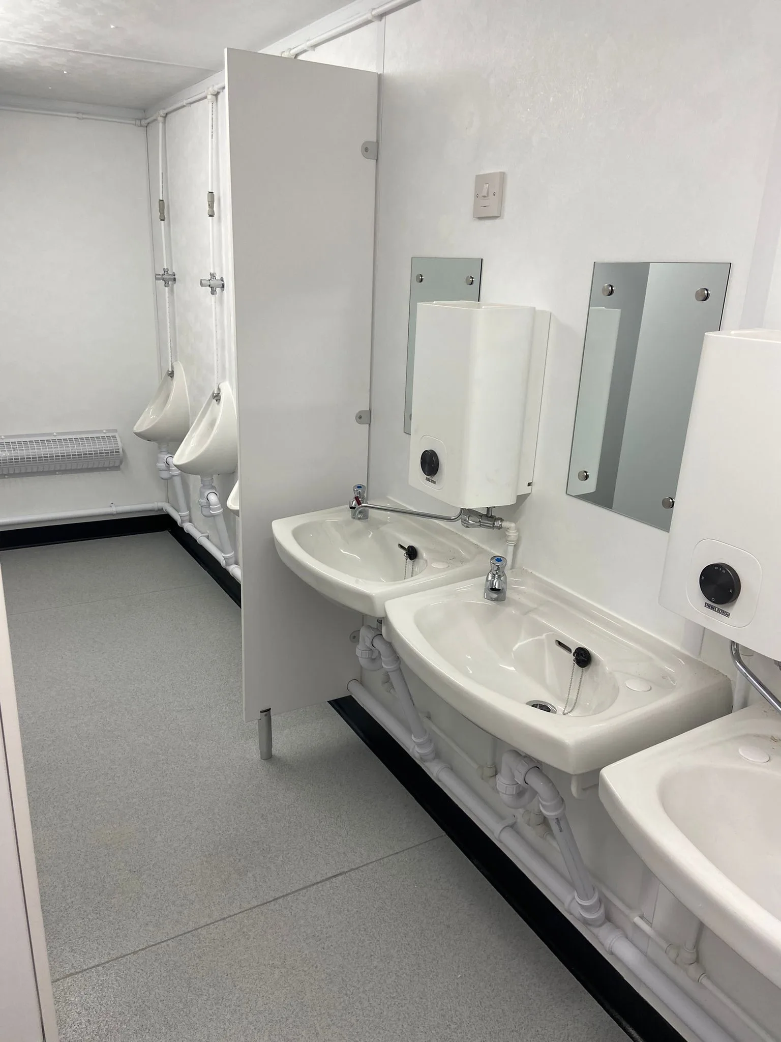 Anti-vandal toilet cabin with extractor fans and insulated interior walls