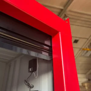Compact 6ft steel storage container with electric coiling door system