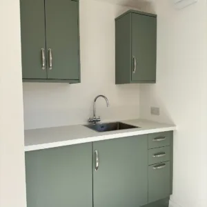 Portable workspace cabin with insulated interior and secure steel construction