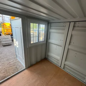 Brand new 7ft shipping container with window and personnel access door